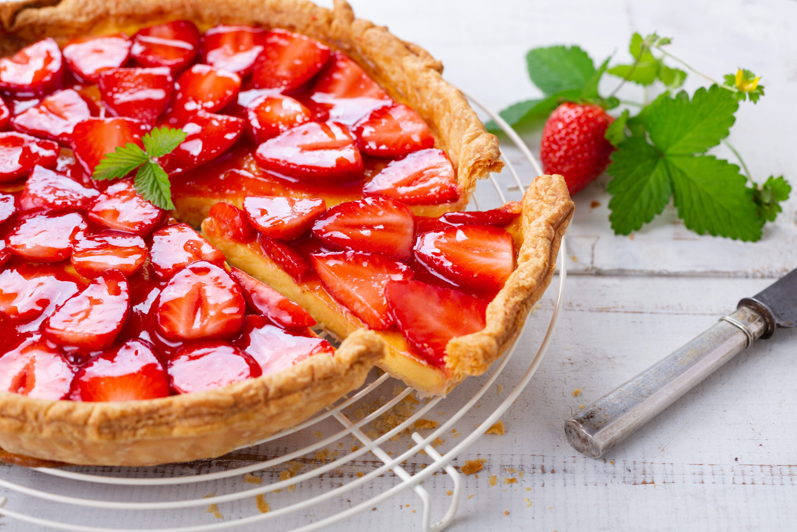 fresh homemade strawberry tart decorated with strawberries
